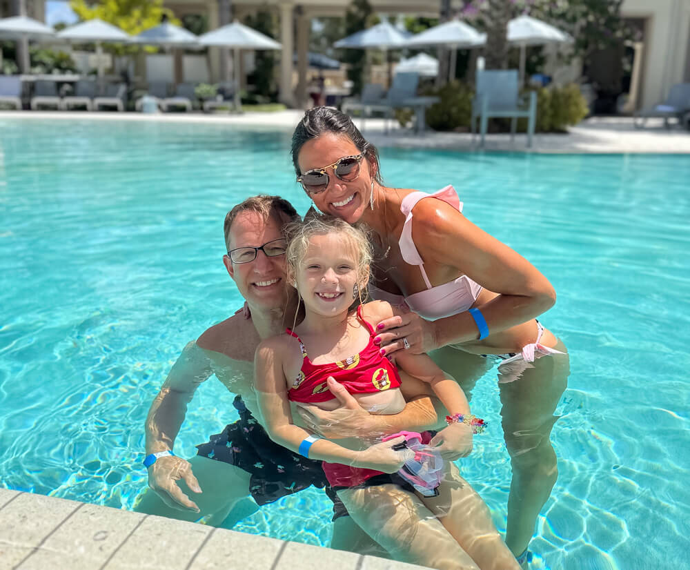 family in pool